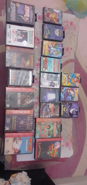 Велозапчасти: Sega boxda olan kasetler biri 50manat hamisni almaq istiyen olsa 40m