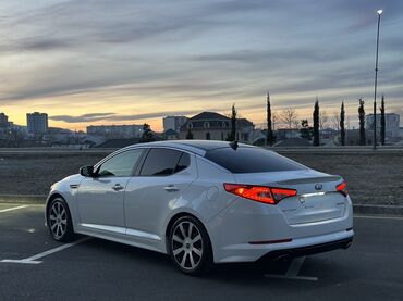 Kia: Kia Optima – ağ rəngli, zərif sedan Xarici xüsusiyyətlər: - Aqressiv — 4