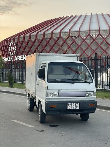 Компактный грузовой фургон (кабина над осью) с бортовой базой и