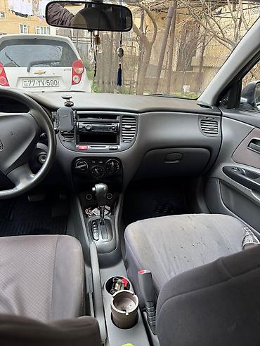 07 2010: Kia Rio: 1.4 l | 2010 il Sedan — 9