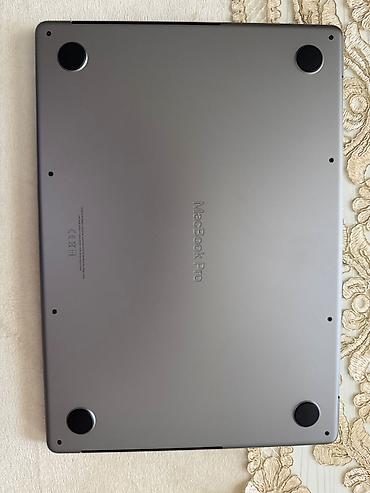 macbook pro m3: MacBook Pro m3 yenikidi 5 defe kinoya baxilib ustunde orginal adapdir — 9