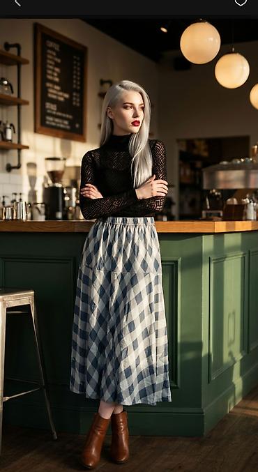 Suknje: Ženska midi suknja sa A-krojem i elastičnim pojasom - Dužina: midi — 9