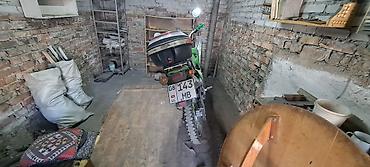 suzuki 200: Мотоцикл Suzuki (эндуро/dual-sport) зелёного цвета. Основные — 4