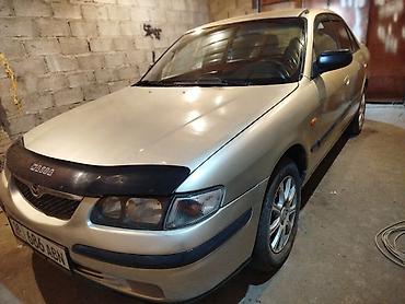 Mazda: Mazda Capella: 1998 г., 1.8 л, Механика, Бензин, Седан — 1