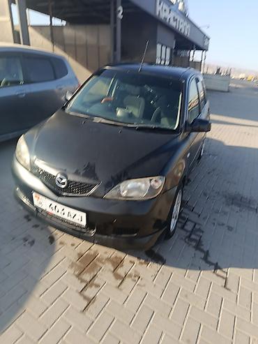 Mazda Demio: 2003 г., 1.5 л, Автомат, Бензин, Хэтчбэк