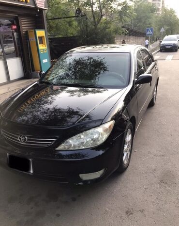 человек собирающий марки: Toyota Camry: 2005 г., 3 л, Автоматические, Бензин, Седан