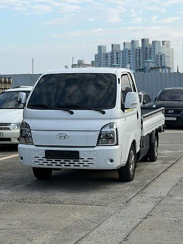wuling starlight 730: Hyundai Porter (портеровский малотоннажный бортовой грузовик), белый — 1