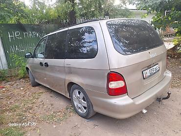 Kia: Kia Carnival: 2000 г., 2.5 л, Механика, Бензин, Минивэн — 3