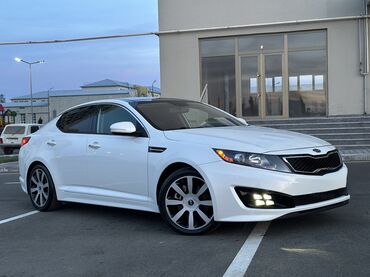 Kia: Kia Optima – ağ rəngli, zərif sedan Xarici xüsusiyyətlər: - Aqressiv — 7