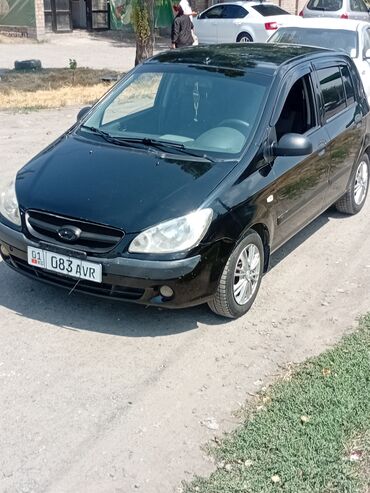 хундай ионик: Черный хэтчбек Hyundai Getz, оснащенный литыми дисками. Автомобиль