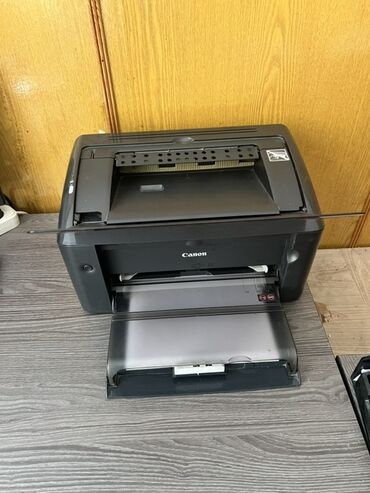 лазерные цветные принтеры: Многофункциональное устройство Canon i-SENSYS MF4018 с лазерной