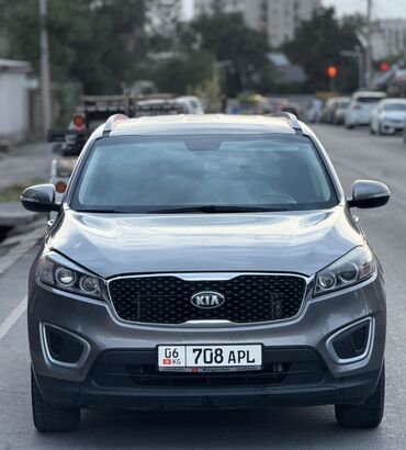 корейские внедорожники: Кроссовер Kia Sorento серого цвета, идеально подходящий для городских