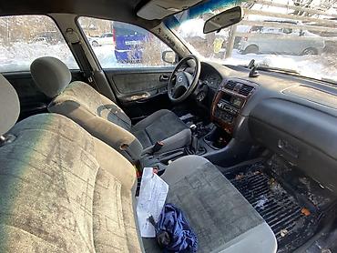 Mazda: Mazda Capella: 1997 г., 1.8 л, Механика, Газ — 6