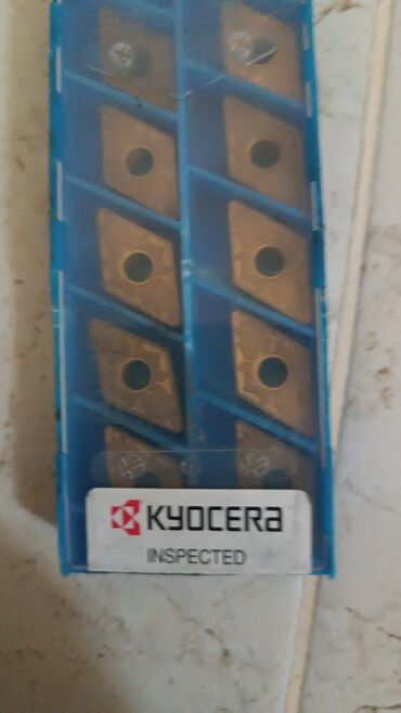 İstehsal avadanlığı: Dəzgah alətləri və kəsici lövhəciklər (freze və torna üçün) — 46