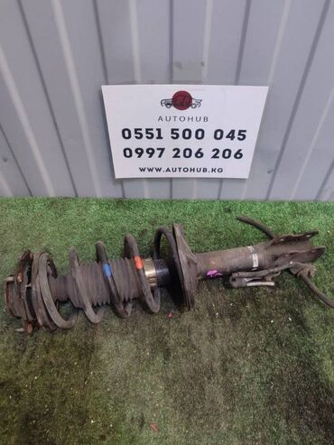 перекачка аморт: Амортизатор Toyota Raum EXZ10 5E-FE 2001 перед. лев. (б/у)