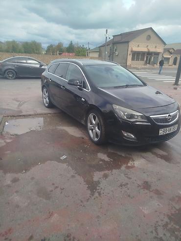 baqaji: Opel Astra: 1.4 l | 2011 il 310000 km Universal — 3