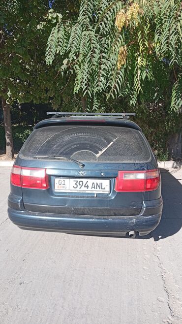 купить шины в бишкеке бу: Универсал Toyota Carina, модель 1996 года, с кузовом синего цвета