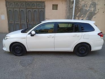 prius on bufer: Toyota Corolla Fielder Hybrid (ağ rəng, universal kuzov) - Yapon — 4