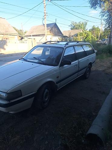 626: Mazda 626: 1993 г. — 5