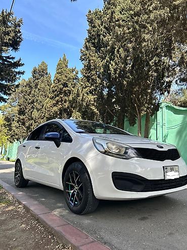 opel duman: Kia Rio: 1.4 l | 2013 il Sedan — 4