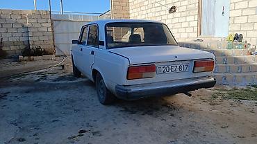 VAZ (LADA): VAZ 2107, ağ rəng, sedan, 4 qapı. Azərbaycan nömrə nişanı: 20-EZ-817 — 4