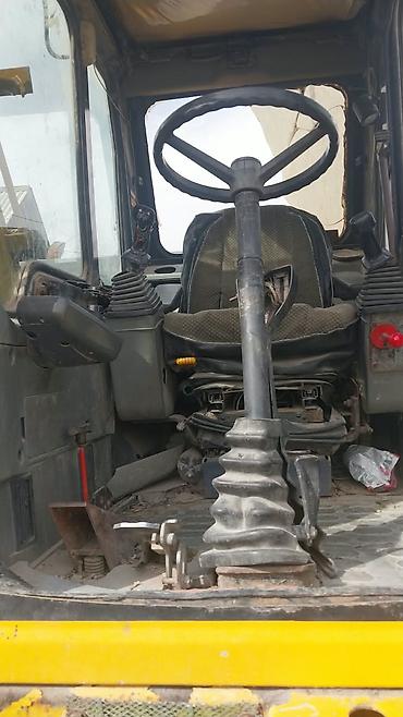 komatsu: Экскаватор, Komatsu, 2004 г., Колесный — 7
