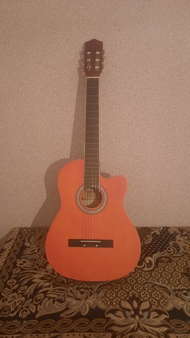 qitara: Akustik gitara, İşlənmiş