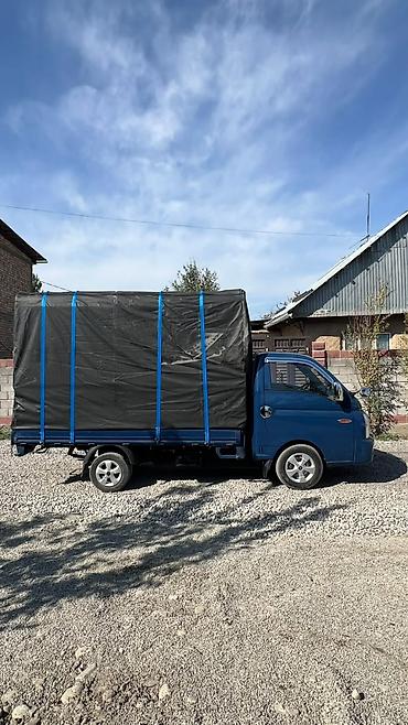 жак а4: Грузовой автомобиль Hyundai Porter с тентованным кузовом. Компактный — 8