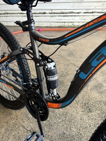 İdman velosipedləri: Ön asqılı, disk əyləcləri və möhkəm çərçivəsi olan dağ velosipedi — 6