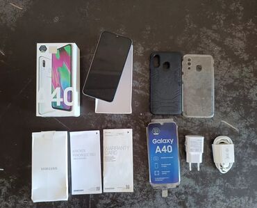 телефон флай 4516: Samsung A40, 64 ГБ, цвет - Белый, Сенсорный, Отпечаток пальца, Две SIM карты
