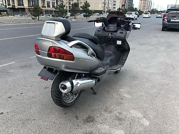 Suzuki: Suzuki Skywave 650 (Burgman) – крупный туристический максискутер — 3