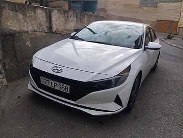 ucuz raf: Hyundai Elantra – ağ rəng, sedan gövdə. Xarici dizayn: - Kəskin — 1