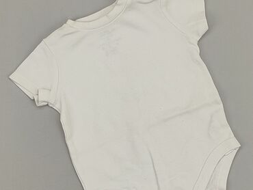 biała bluzka z czarną kokardą: Body, F&F, 9-12 m, 
stan - Dobry