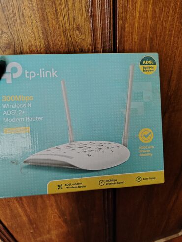 tp link fiber optic modem: Wifi Tp link satilir. Ciddi alicilar yazsin. Köhnə modemdir. Cəmisi 20