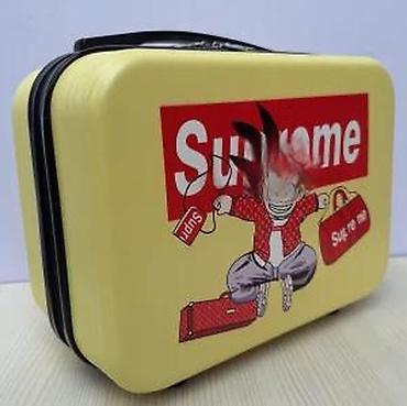 Putni koferi i torbe: Set kofera za putovanja – 2 u 1, žuta boja sa animiranim printom - — 29