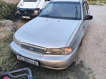 део такума: Daewoo Nexia: 2001 г., 1.5 л, Механика, Газ, Седан — 2