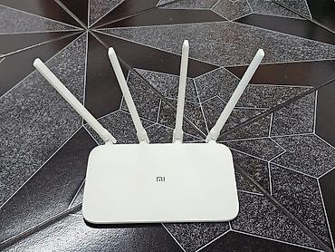 Модемы и сетевое оборудование: Xiaomi Mi Router 4A Gigabit Edition. (Б/у, в идеальном стостоянии — 2