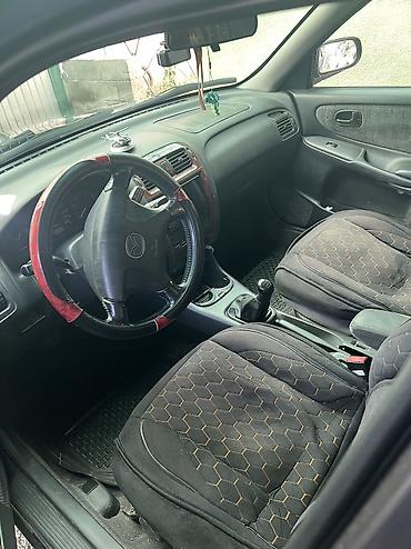 форт бензин: Mazda Capella: 1998 г., 2 л, Механика, Бензин, Универсал — 4