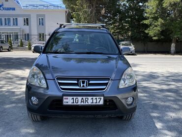 срочно продать машину: Продается Honda CR-V серого цвета. Номера 10 регион . Компактный