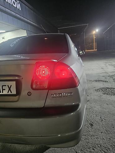 mazda 3 2005: Honda Civic: 2004 г., 1.5 л, Автомат, Гибрид, Седан — 7