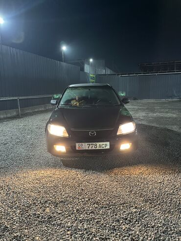 Mazda: Mazda 323: 2002 г., 1.6 л, Механика, Бензин, Хэтчбэк — 10