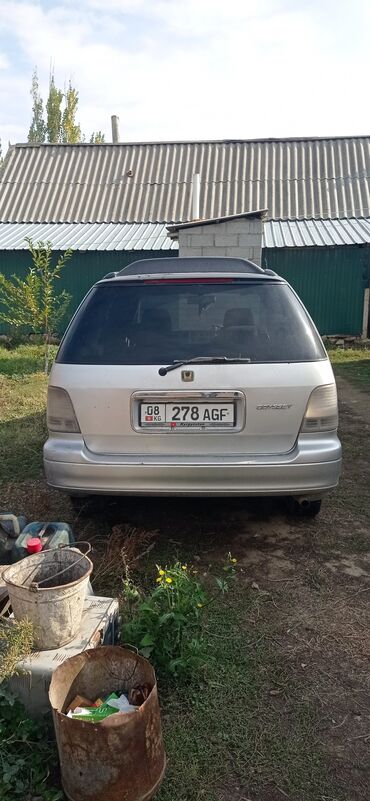 тико уна: Honda Odyssey: 1999 г., 2.3 л, Автомат, Бензин, Вэн/Минивэн