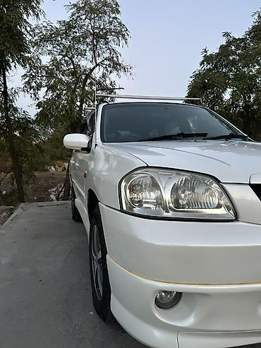 трибут: Mazda Tribute: 2005 г., 2.3 л, Автомат, Бензин, Кроссовер — 4