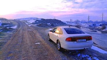 subaru legacy машина: Mazda Cronos: 1993 г., 2 л, Механика, Дизель, Хэтчбэк