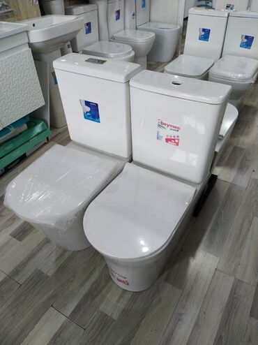 çanağ: Ağ rəngli, keramikadan hazırlanmış unitaz dəsti, müasir hamam otaqları