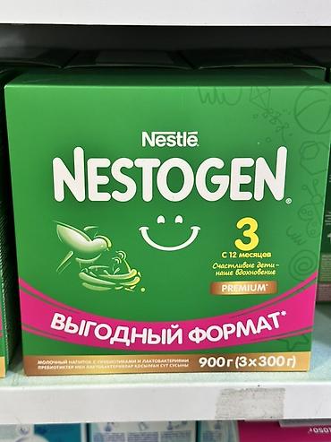 смесь nestogen: Nestlé NESTOGEN 3 Premium — молочный напиток с пребиотиками и — 1