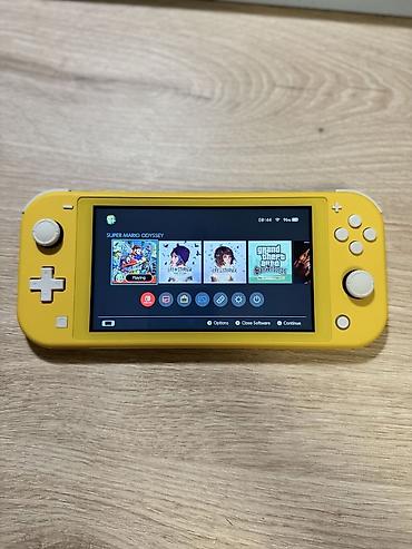 nintendo switch lite ikinci el: Nintendo Switch Lite oyun konsolu, ideal veziyyetdedir, seliqeli — 3