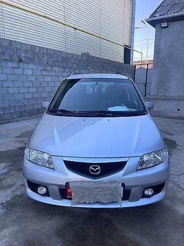 саната желтый: Mazda PREMACY: 2004 г., 1.8 л, Механика, Бензин, Универсал — 1