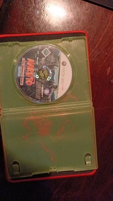 Oyun diskləri və kartricləri: Xbox 360 üçün Naruto: The Broken Bond oyunu. Oyun disk şəklindədir və