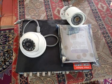 Videokameralar: Salam 8 li diviyar,,2 eded kamera,4 TV disk cemi 200 AZN son qiymeti